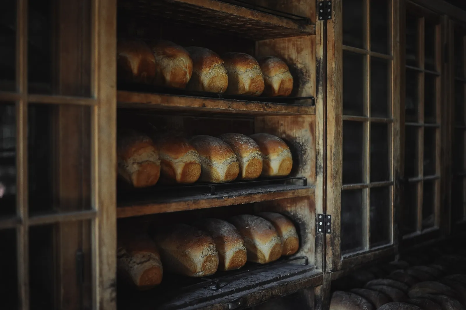 Loaves of bread on bakery shelves. The photo was not taken at a Jupiter bakery.