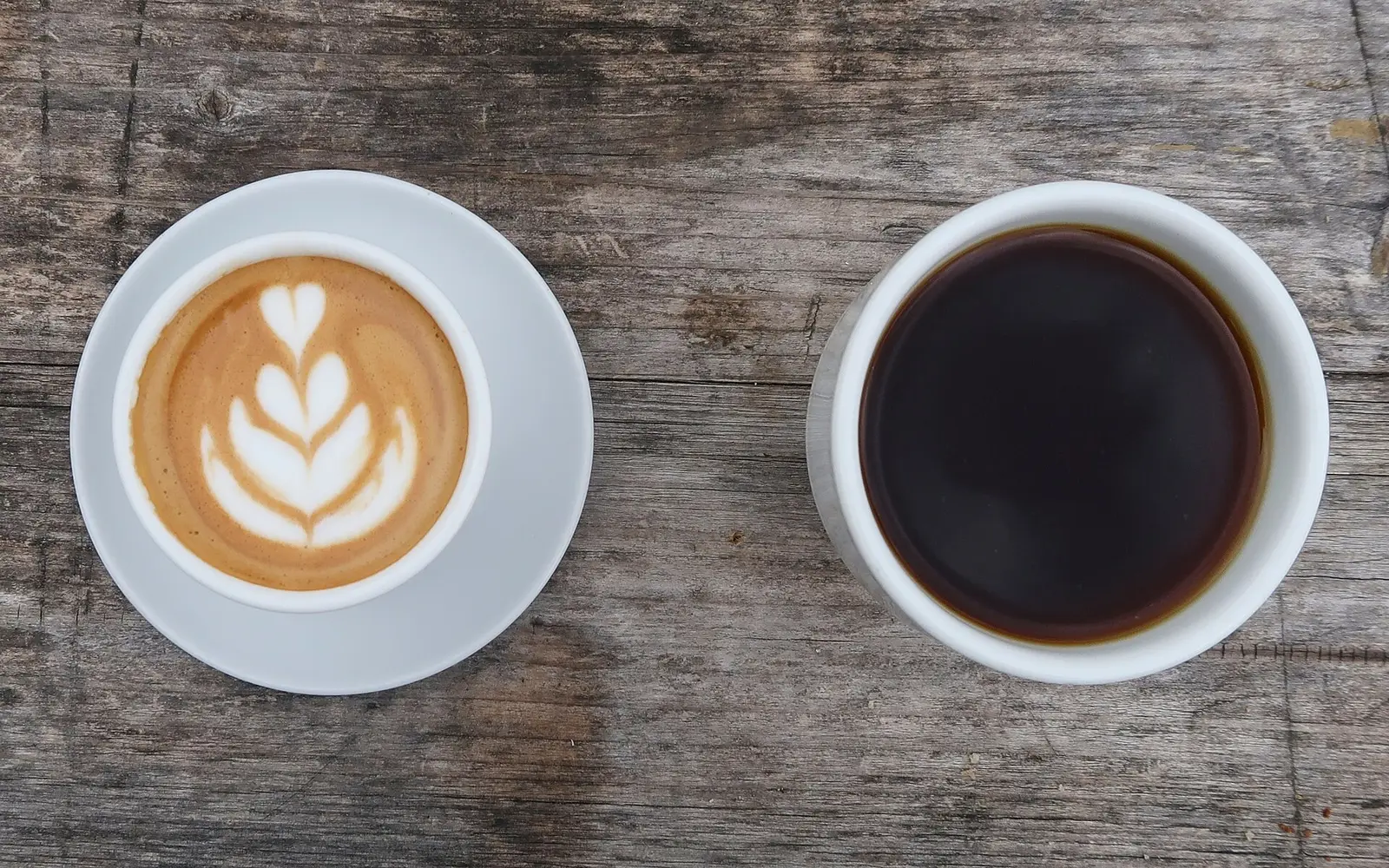 A latte and a cup of black coffee. The photo was not taken at a Jupiter cafe.