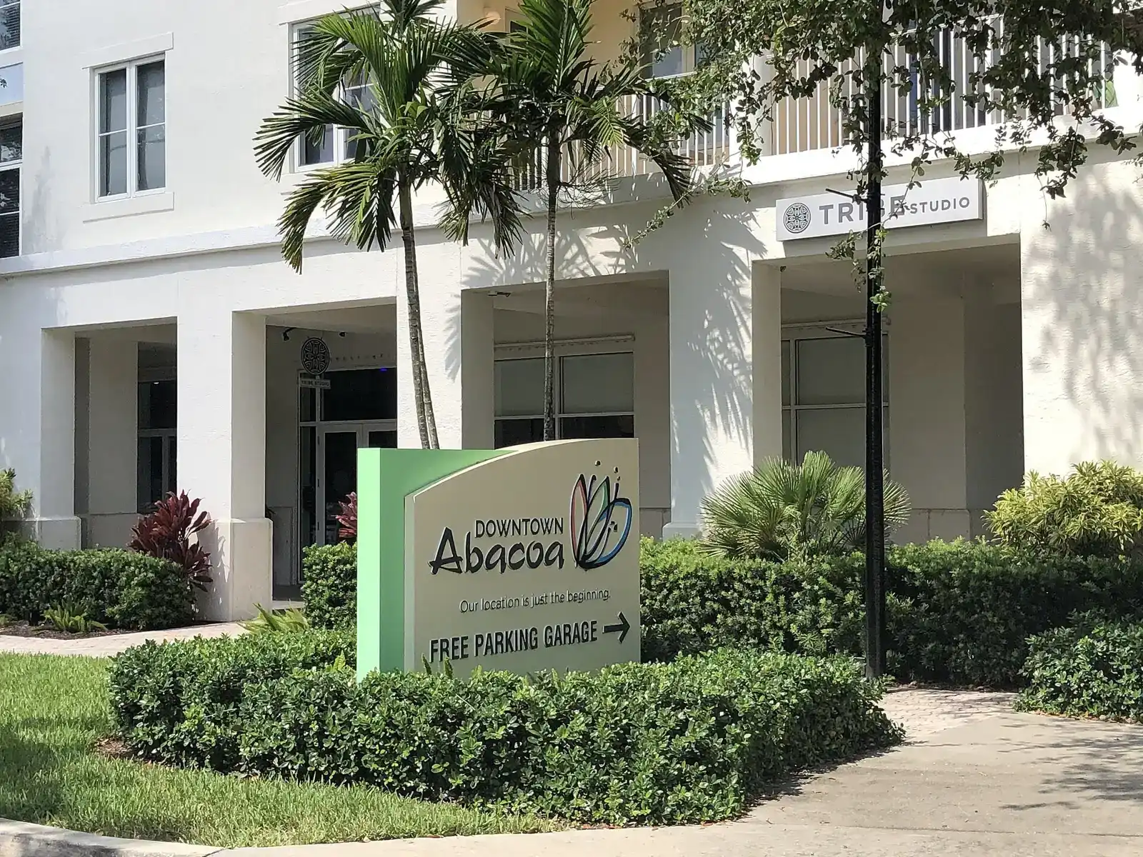 The Downtown Abacoa sign and storefront buildings in Abacoa, the planned community in Jupiter.