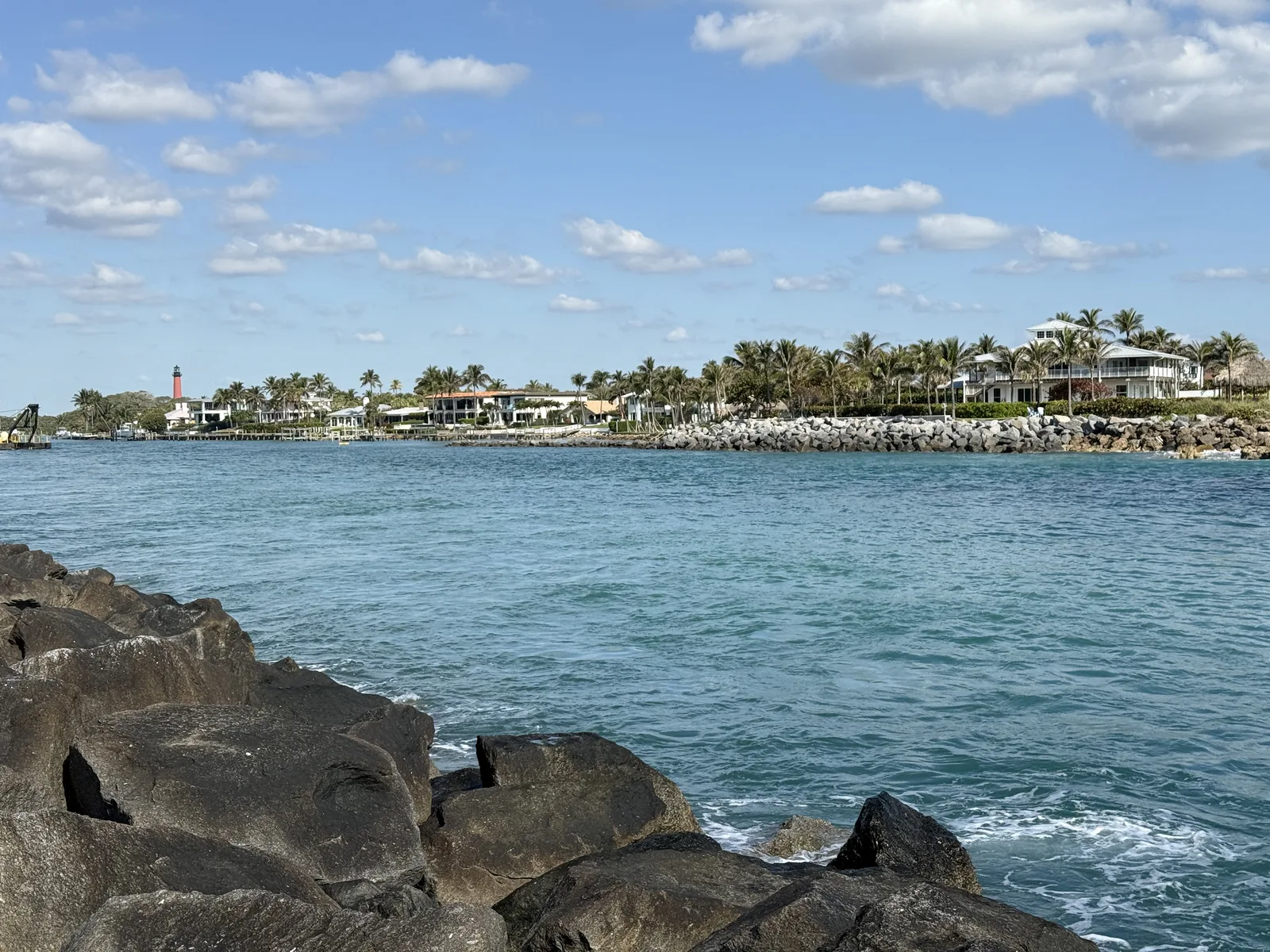 The Jupiter Inlet looking west from DuBois Park, with the Jupiter Inlet Lighthouse in the distance. The Sperry property is farther west on the inlet's south shore and is not in the picture.
