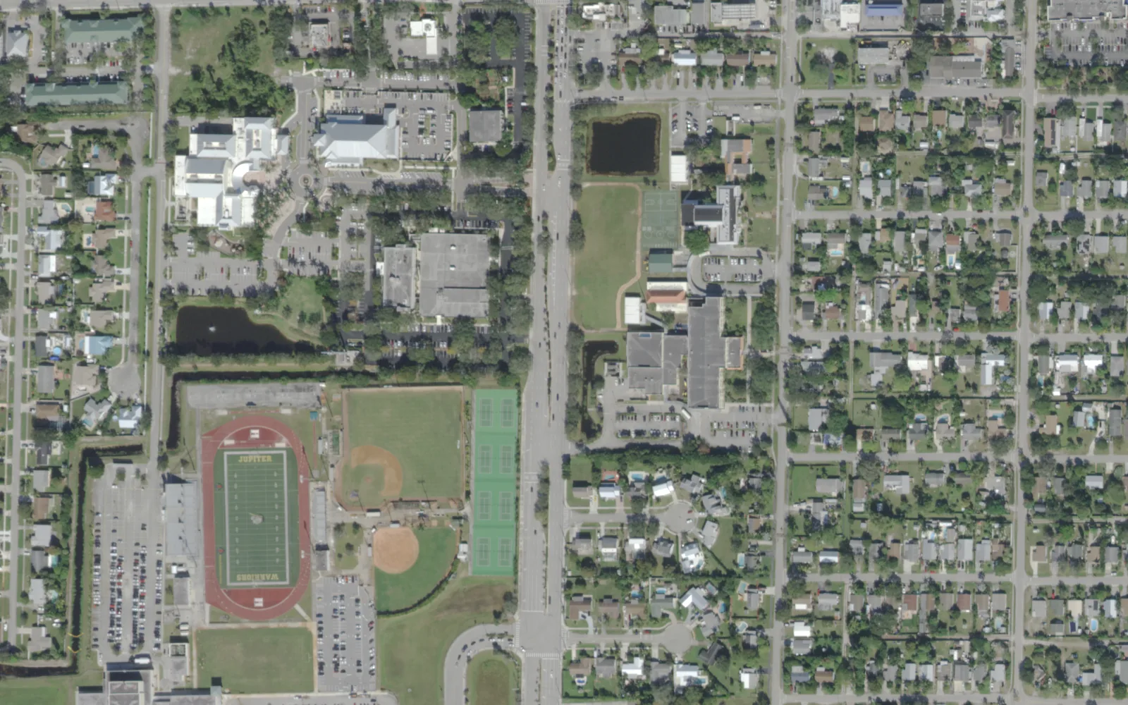 Jupiter Elementary, right of center, with the Jupiter High stadium and ball fields to the west, seen from the air